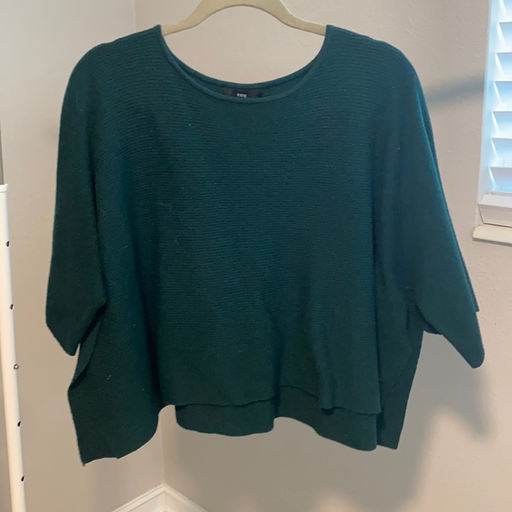 green knit top with wide sleeves